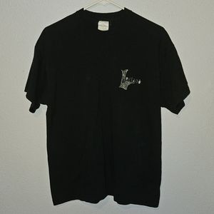 Black T-shirt with Ireland printed on front.